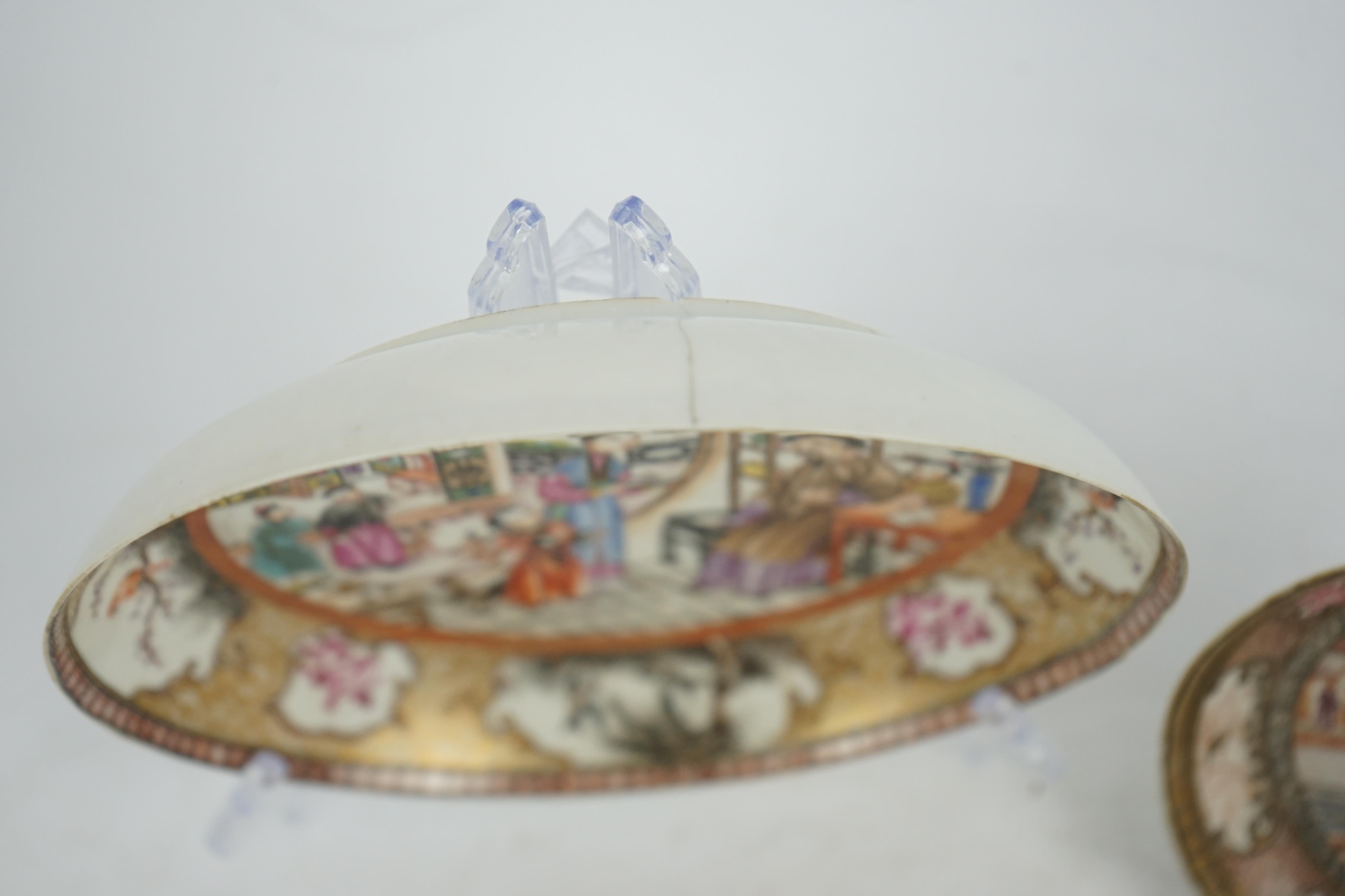 A Chinese ‘mandarin’ pattern tea bowl, coffee cup and saucer, Qianlong period